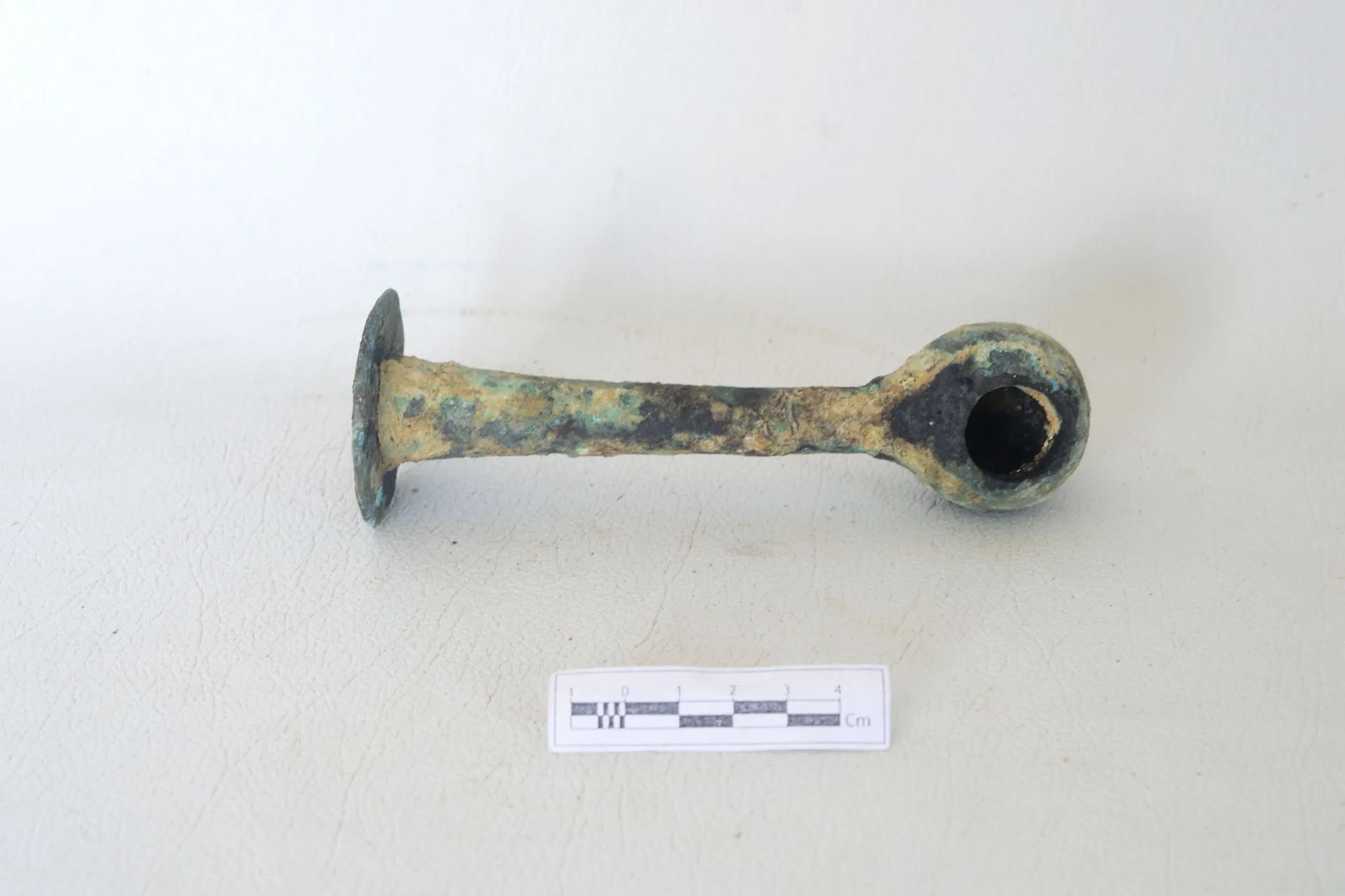 A part of a copper alloy hinge — Maritime Archaeology Museum